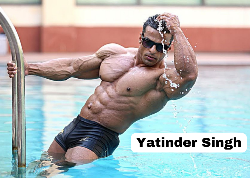 Yatinder Singh showing his body in a swimming pool